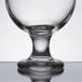A close up of a Libbey Belgian Beer Tasting Glass with water in it.