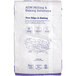 A white bag of ADM High Gluten Flour with blue text.