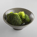 A close-up of broccoli in an Elite Global Solutions mushroom-colored melamine bowl.