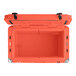 A coral CaterGator outdoor cooler with the lid open and black handles.