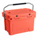 A coral CaterGator outdoor cooler with a handle.
