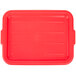 A red plastic Vollrath Traex food storage box lid with a recessed circle in the middle.