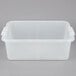 A Vollrath Traex clear plastic container with white handles and a white lid.