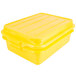 A yellow plastic Vollrath Traex food storage container with a snap-on lid.