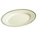 A white oval platter with a green trim.