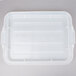 A white plastic Vollrath Traex food storage container with a clear lid.