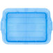 A Vollrath blue plastic lid with raised lines and a handle.