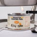 A can of Choice 2 Hour Ethanol Gel Chafing Dish Fuel on a table in a catering event.