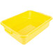 A yellow Vollrath Traex food storage container with a handle.