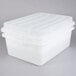 A Vollrath white plastic food storage box with raised snap-on lid.