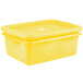 A Vollrath yellow polypropylene storage container with a lid.