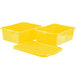 Three yellow plastic storage containers with lids, one of which is open.