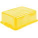 A yellow plastic Vollrath Traex food storage container with a standard lid.