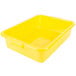 A Vollrath yellow plastic food storage container with a raised snap-on lid.