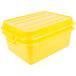 A Vollrath yellow plastic Traex Color-Mate food storage box with lid.