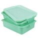 A stack of three green Vollrath Traex plastic containers with recessed lids.