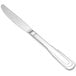 A Oneida Cityscape stainless steel dinner knife with a silver handle.