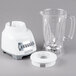 A Proctor Silex white blender with a glass pitcher on a white surface.
