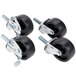 A set of four Bulman casters with black rubber wheels and metal screws.