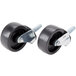 A pair of Bulman casters with black rubber wheels and metal nuts on them.