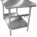 A stainless steel work table with a pot rack underneath.
