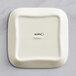 A white square Acopa porcelain butter dish with black text reading "Acopa" on the lid.