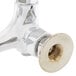 A chrome plated T&S wall mounted pantry faucet with a brass nut.