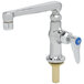 A silver T&S deck-mount faucet with a blue handle.