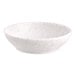 A small, round, white melamine ramekin with a speckled pattern.