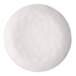 A white round melamine plate with a subtle speckled pattern.