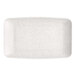 A white rectangular melamine platter with a speckled pattern.