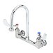 T&S B-0350-04 Wall Mounted Surgical Sink Faucet with 8" Adjustable Centers, 5 9/16" Rigid Gooseneck, and 4" Wrist Action Handles Main Thumbnail 1