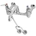 A T&S chrome wall mount mop sink faucet with two handles.