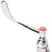 A T&S polished chrome wall mount mop sink faucet with red wrist action handles.