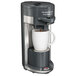 A Hamilton Beach FlexBrew single cup coffee maker with a white mug of coffee on the side.