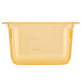 A Vollrath amber plastic food pan with a lid.