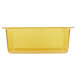 A yellow Vollrath plastic food pan with a white border.