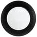 A black glass charger plate with a white rim.