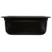 A black rectangular Vollrath plastic food pan with a lid.