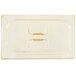A white rectangular plastic lid with gold trim.