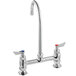 A chrome deck-mount faucet with an 8-inch gooseneck spout, 8-inch centers, and lever handles for hot and cold water.