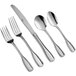 A five-piece set of stainless steel flatware including two forks, a knife, and two spoons.