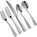 A five-piece set of stainless steel flatware including two forks, a knife, and two spoons.