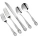 A five-piece set of stainless steel flatware with ornate handles, including two forks, a knife, and two spoons.