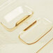 A clear plastic slotted lid with a gold edge.