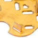 A close-up of a yellow plastic Vollrath Super Pan drain tray with holes.
