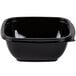 A black plastic Sabert deli bowl with a lid.