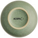 The image shows the bottom view of a small, round, sage green bowl with a matte finish and the brand name 'ACOPA' printed on the base.