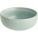 A small, round, light blue bowl with a matte finish.