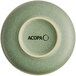 The image shows the underside of a sage green bowl with a matte finish and the word 'ACOPA' printed on the base.